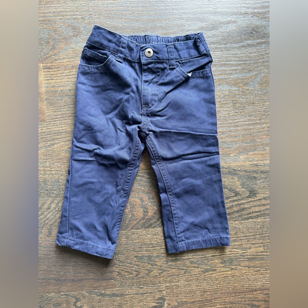 12 month boys Calvin Klein Navy jeans. Looks brand new. Excellent condition